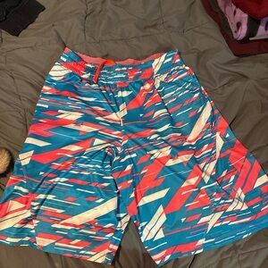 Under Armour Blue and Pink Athletic Shorts with Dynamic Geometric Design